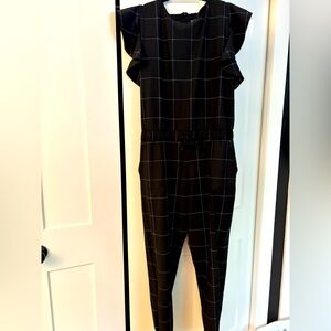 Adorable black jumpsuit. Size medium